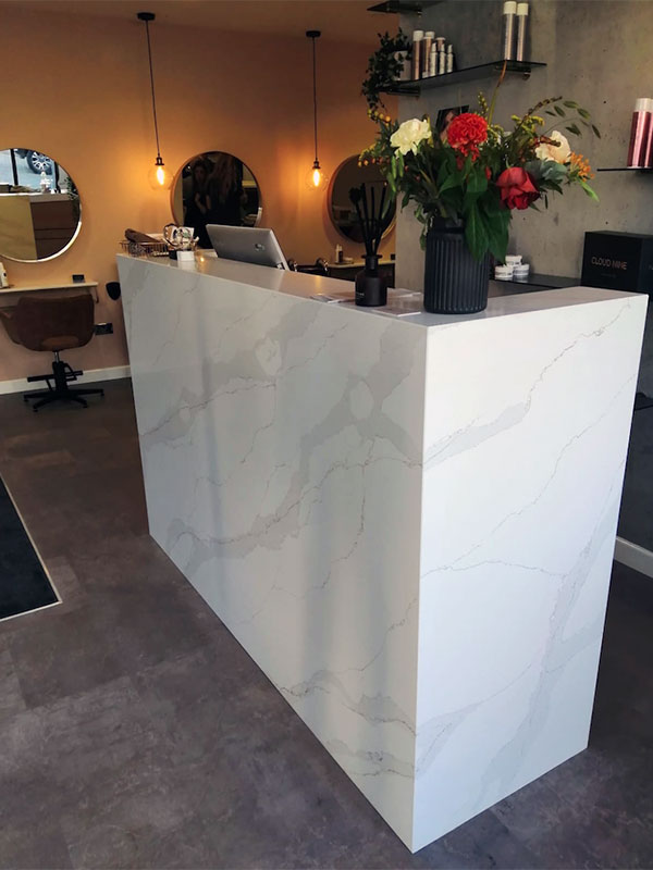 CQS Calacatta Gold reception desk with mitred joints CQS Calacatta Gold reception desk with mitred joints